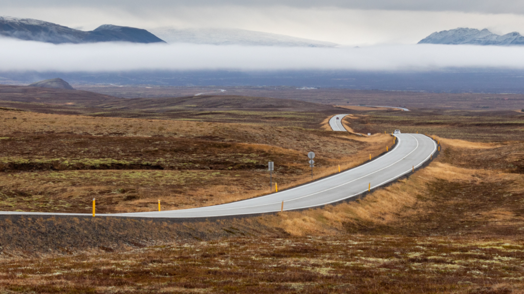 Winding, rising, and falling road in South Iceland.