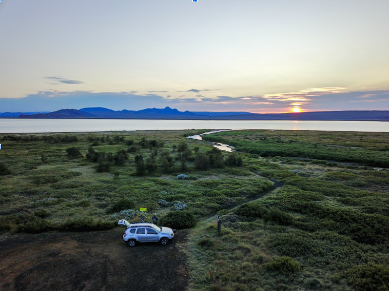 People preparing to fish for brown trout in Iceland.